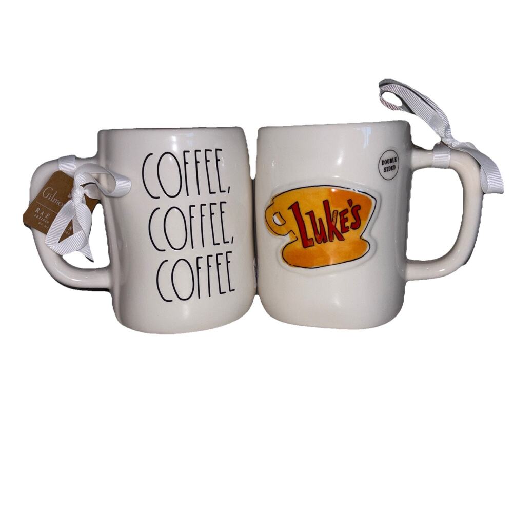 GILMORE GIRLS by Rae Dunn 
White Mug with Black Lettering Yellow Accent (Luke's)